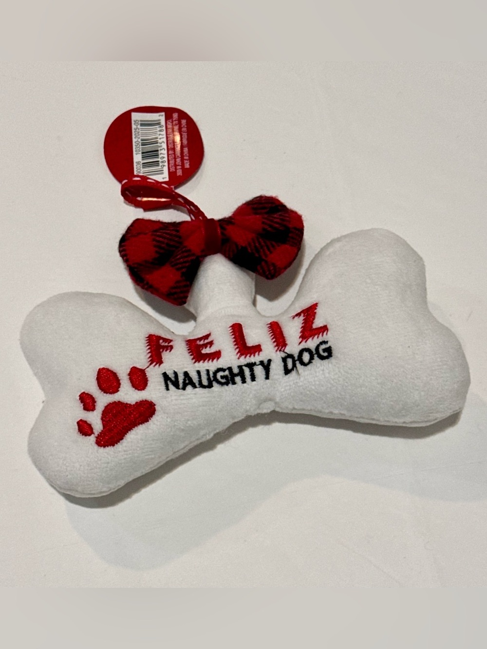 🌴 Feliz Naughty Dog Plush Bone Toy with Red Bow